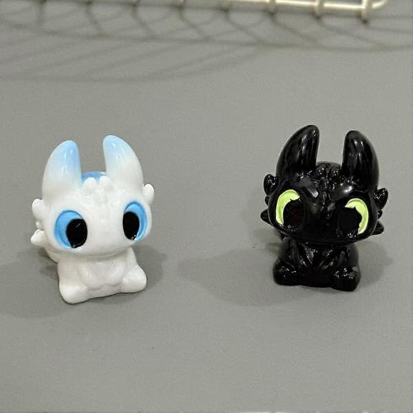 Blød plastik dinosaurfigur - harpiks, 3,4 cm, nøglering two sided