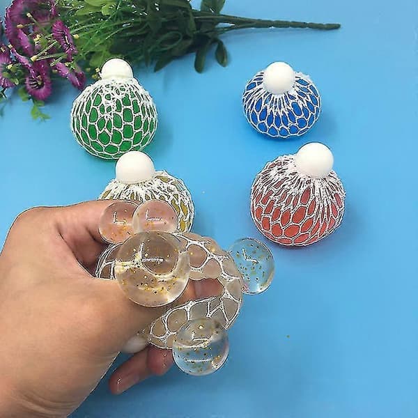 4 stk. tilfældige net-squishy-bolde stressaflastende klem-druebolde