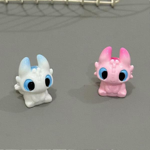 Blød plastik dinosaurfigur - harpiks, 3,4 cm, nøglering two sided