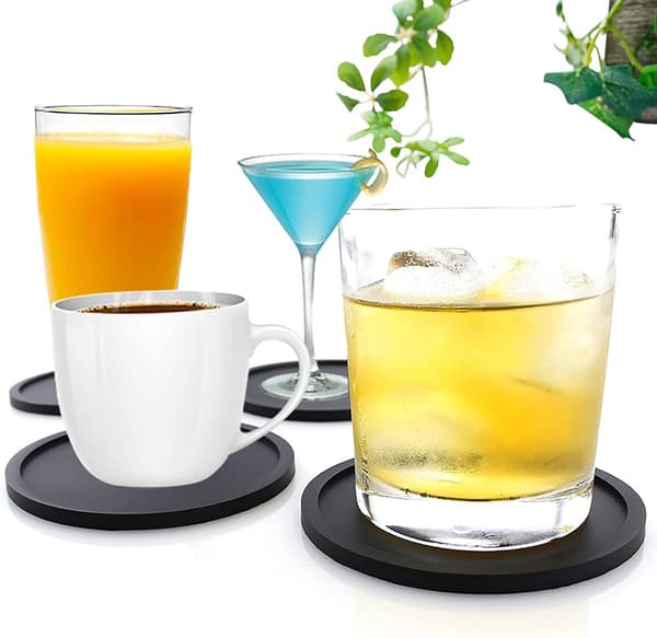 Et sæt med 12 silikone coasters - dækkeservietter - sorte runde coasters - 10 x 0,3 cm