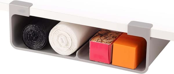 Oppbevaringsstativ for plastfolie under skap, egnet for ruller opptil 33 cm brede.