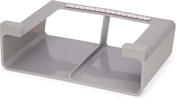 Oppbevaringsstativ for plastfolie under skap, egnet for ruller opptil 33 cm brede.