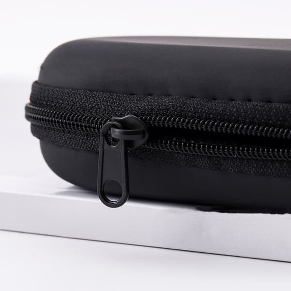 Ovalformat hörlursfodral, bärbart, kan förvara hörlurar, datakablar och USB-minnen, svart.