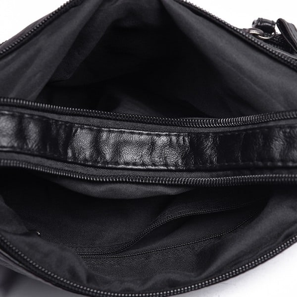 Mjuk medelstor svart läderväska i nappaläder med lång axelrem - Kan bäras över kroppen svart