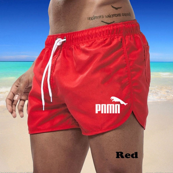 Flerfärgade sportshorts i strandpolyester med tre punkts pnmn Red M