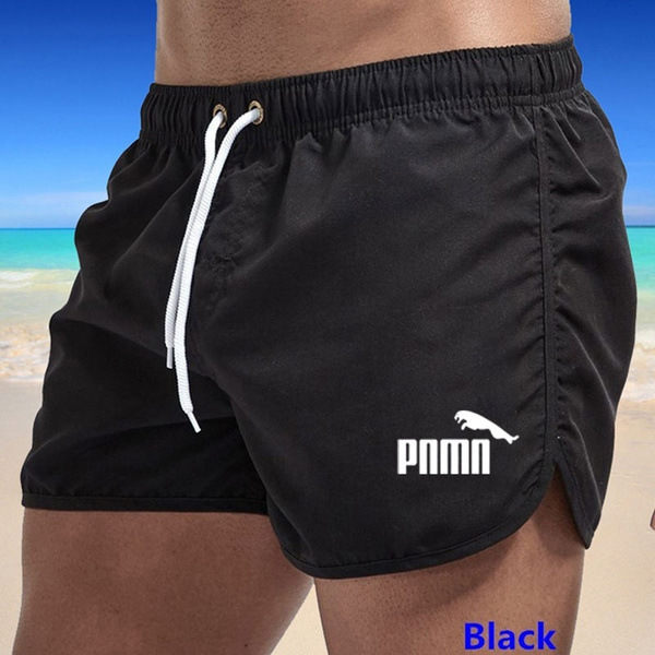 Flerfärgade sportshorts i strandpolyester med tre punkts pnmn Black S