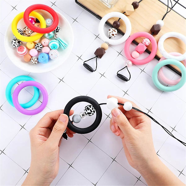 32 kpl silikonihelmiä, 65 mm pyöreä silikoni silmukka, jossa on 2 reikää DIY-avaimenperän kaulakoruun
