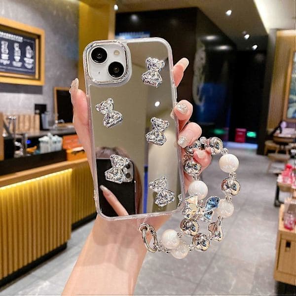 For iPhone 14 Deksel Stilig Speiloverflate TPU+PC Telefon Bakside med Armbånd