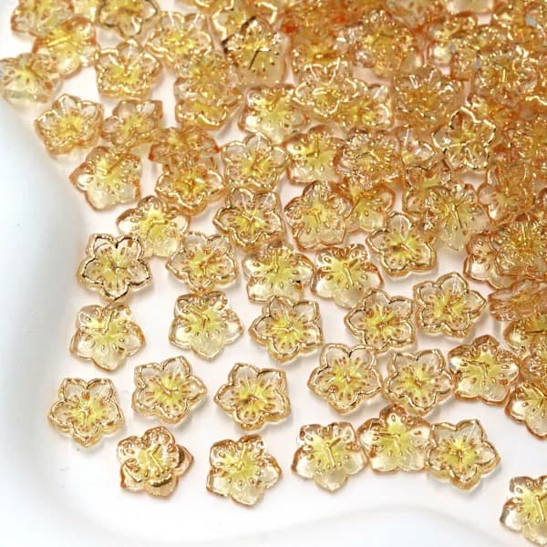 100 stk. gule is-transparente guldkantede timeglasblomster til neglekunst