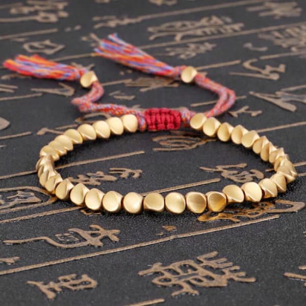 Tibetansk flätad stickad kopparpärlor lyckoband armband G
