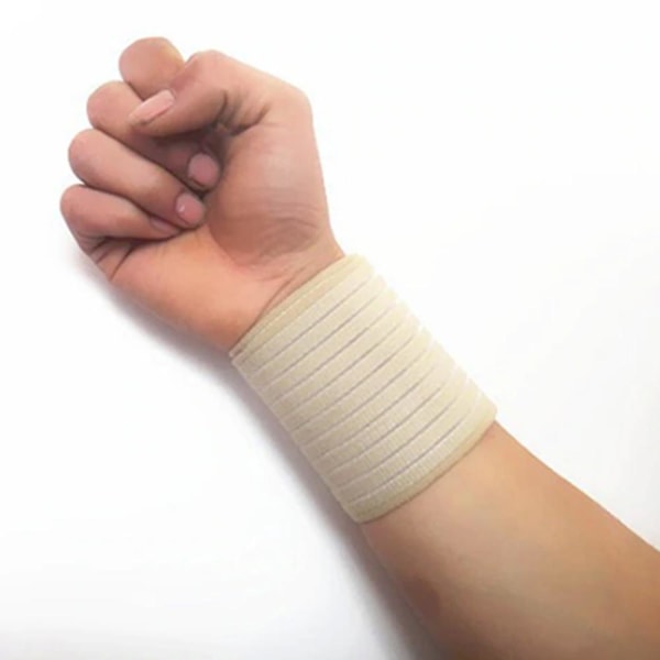 Elastiskt enkelt handledsstöd - beige