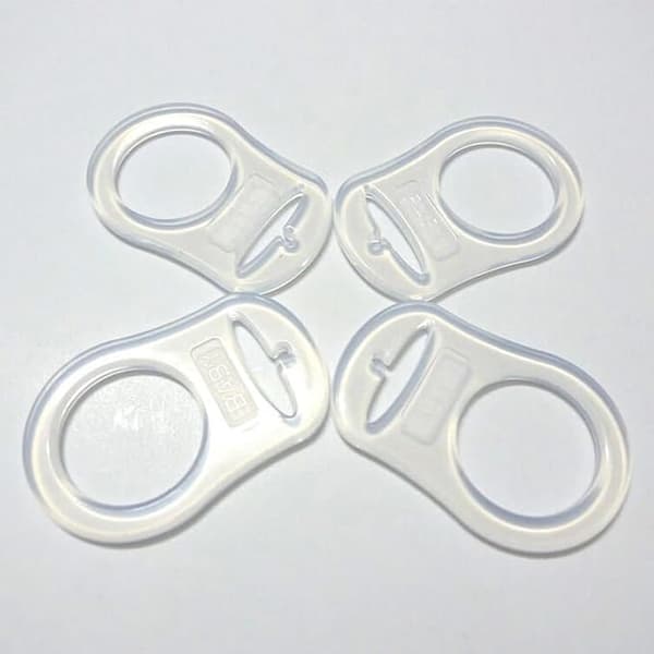 Set med 4 knappringar/adaptrar för napphållare (transparent)