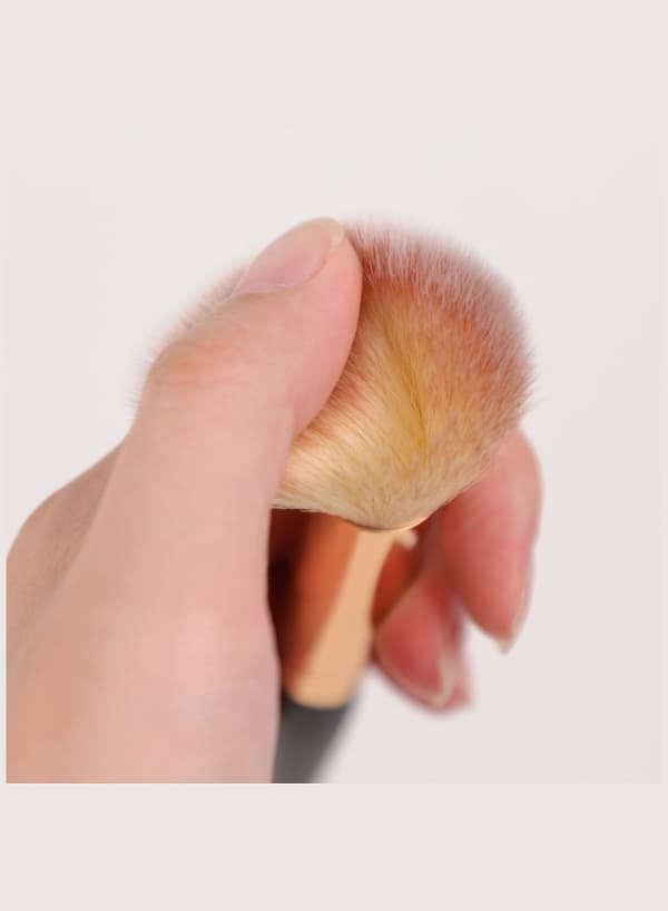 Enkelt dobbelthovedet makeupbørste PVC-materiale guld