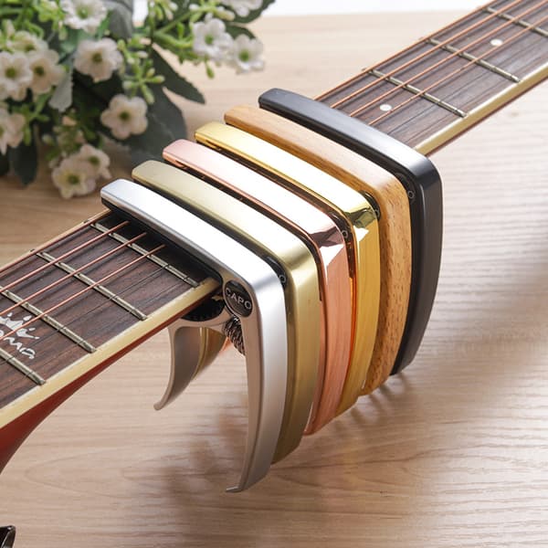 [YD]Gitarrcapo av sinklegering (Sølv), Metallcapo, Ukuleleklemme, Plekter, Capo Gitartilbehør