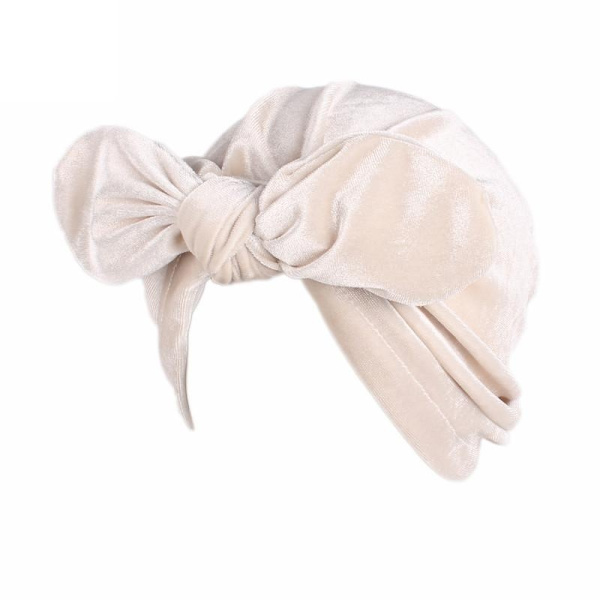 Luksuriøs turban i fløyel med sløyfeeffekt i flere farger Beige one size