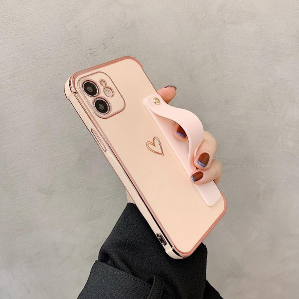 iPhone 13-deksel med hjerte og ankelstropp gulldetaljer pastell Pink one size