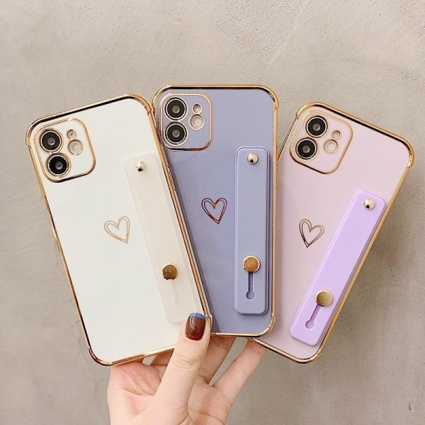 iPhone 13 kotelo sydämen ja nilkkahihnan kullanvärisillä yksityiskohdilla White one size
