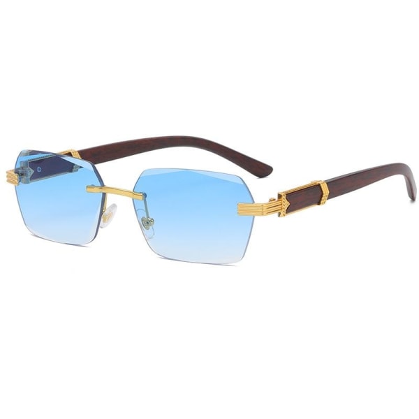 Detaljerede solbriller med trædetaljer & kanter i guld blåt glas Blue one size