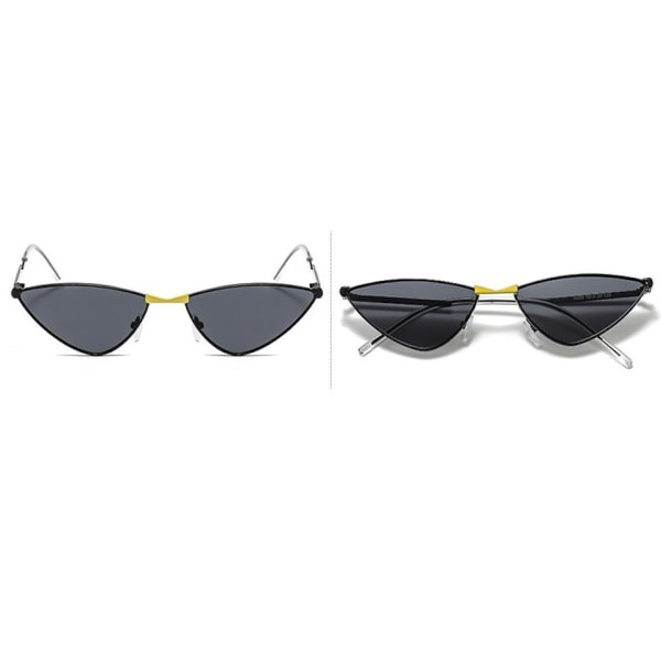 Minimalistiska svarta solglasögon med gulddetalj cat-eye Svart one size