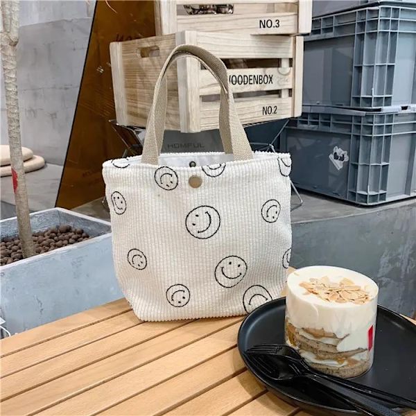 Liten tote väska i manchestertyg med glada smileys Beige