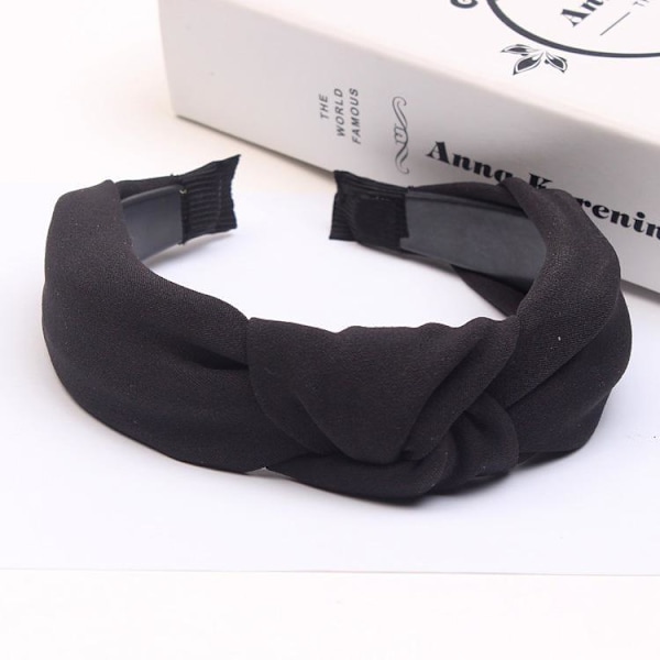 Kaunis tiara, jossa on solmu kangasta useissa eri väreissä Black one size
