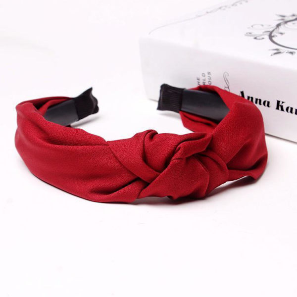 Kaunis tiara, jossa on solmu kangasta useissa eri väreissä Black one size