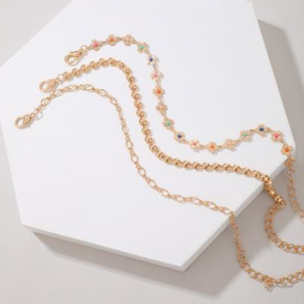 Sæt med 3 rhodinerede armbånd med blomster i forskellige farver Gold one size