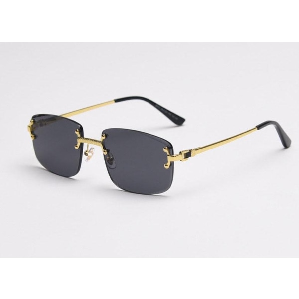 Dine nye solbriller - uden stel og med lækre detaljer i guld Black one size