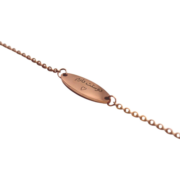 Ruusukultainen rannekoru, jossa teksti "Dostat daram" persialaisessa joululahjassa Pink gold one size