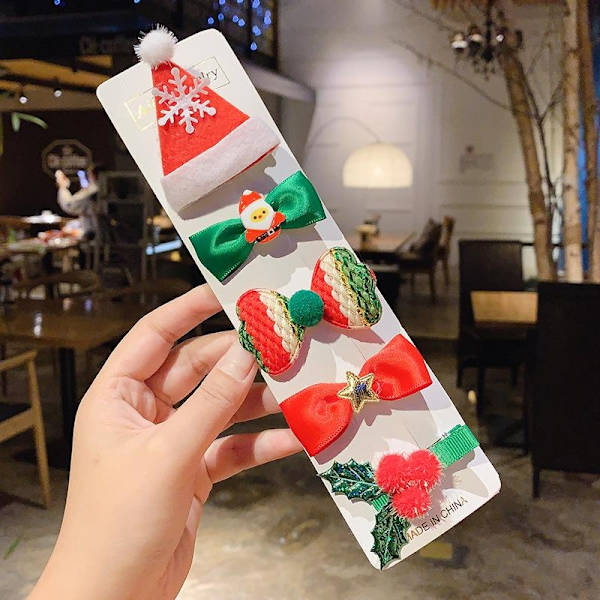 Sarja hiusklipsiä, joissa on jouluaiheinen joulukuusi tonttutähti lumiukko Red Santas hat