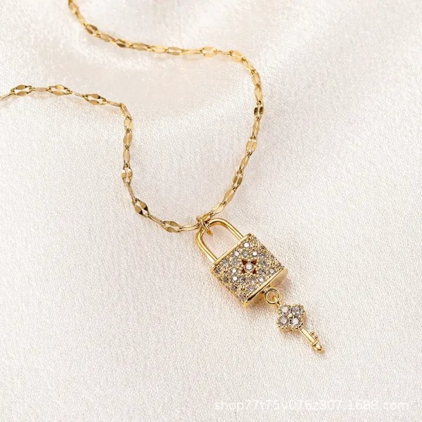 Gold-plated necklace chain with lock and key in rhinestones Gold one size