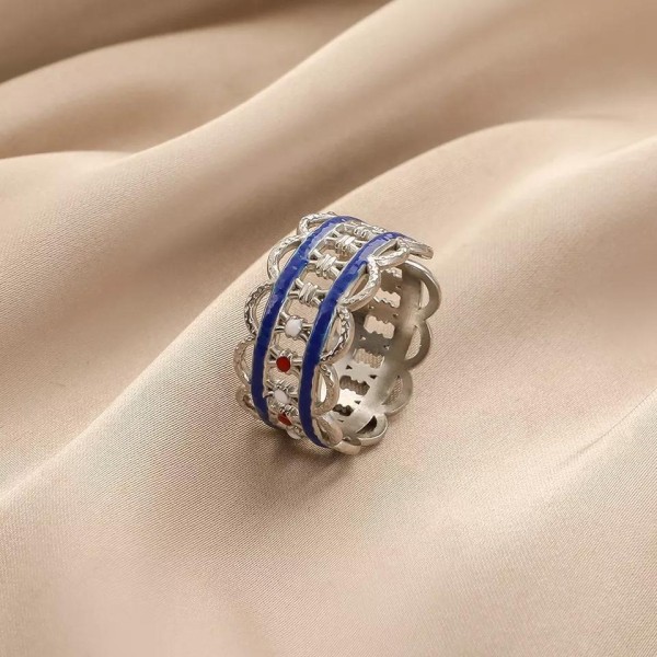 Unikt ringmønster med blå eller rød ståldetalj Silver one size