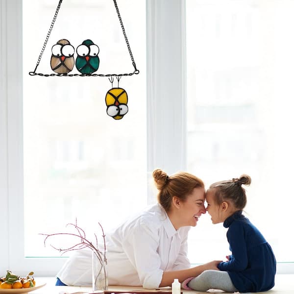 Farget glassugle på tråd - lysfangerpanel