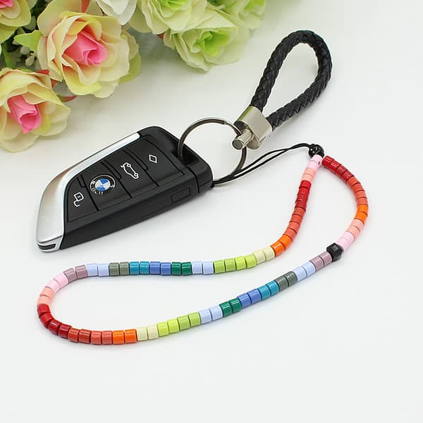 Telefonrem Charm - Matt Regnbue