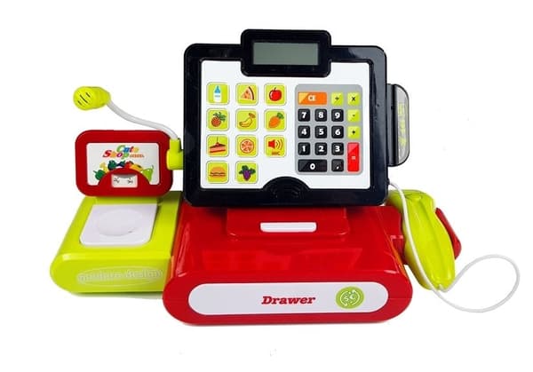 Lelukassa vaa'alla ja tarvikkeilla, kolikot, setelit ja elintarvikkeet 34x19 cm