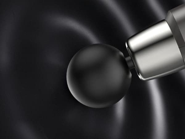 Massagepistol med 4 massagehoveder 6 niveauer USB-C grå