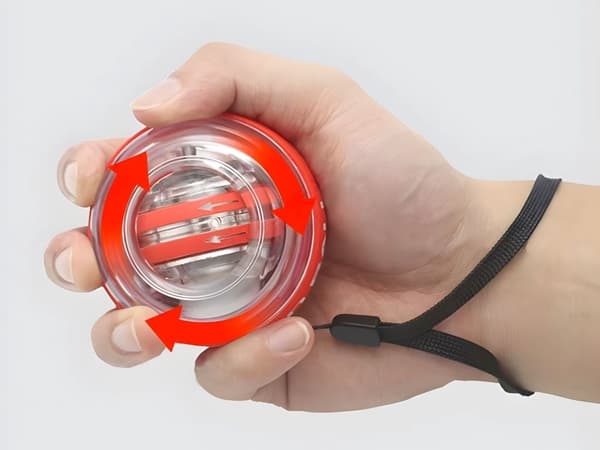 Gyroball træningsbold til håndled/underarm med håndledsrem, tilfældig farve