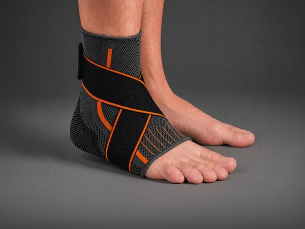 Ankelstöd med kardborre, elastiskt bandage 25 cm, grå/orange
