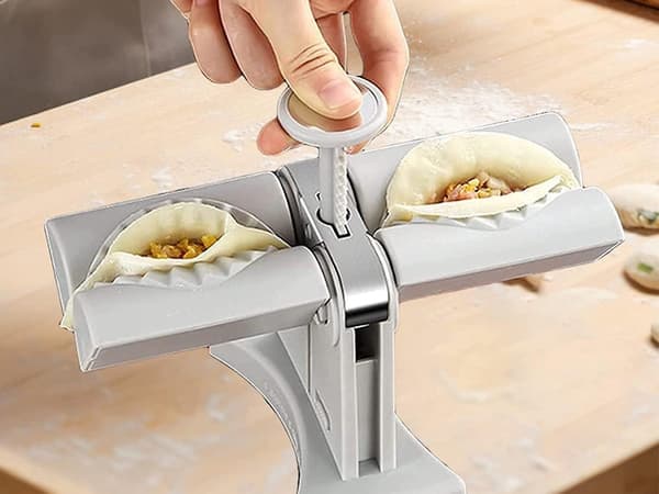 Dumplingsmaskine manuel 8,5 cm grå med skridsikre fødder