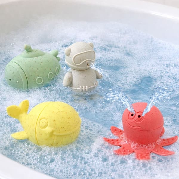 Badleksaker i gummi 4-pack delbara figurer med vattensprut