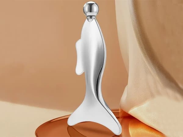 Ansigtsmassager gua sha i rustfrit stål med kugle 13 cm