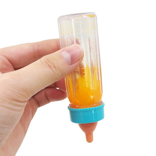 4 st Baby Dockor Matningsflaska Magisk Set Försvinnande Mjölk Prete orange 2pcs