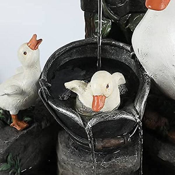 Aurinkoenergiainen orava-ankka hartsi patsas, painevesisuihkupatsas puutarhan koristeluun