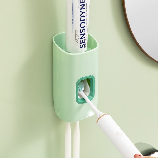 Grön automatisk tandkrämsdispenser Badrumstillbehör