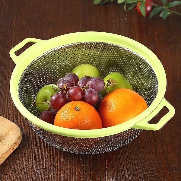 Suuri ruostumattomasta teräksestä valmistettu siivilä kahvoilla ja jaloilla