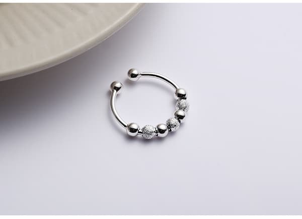 Anti-stress ring med 7 roterbare kobberperler Silver Sølv