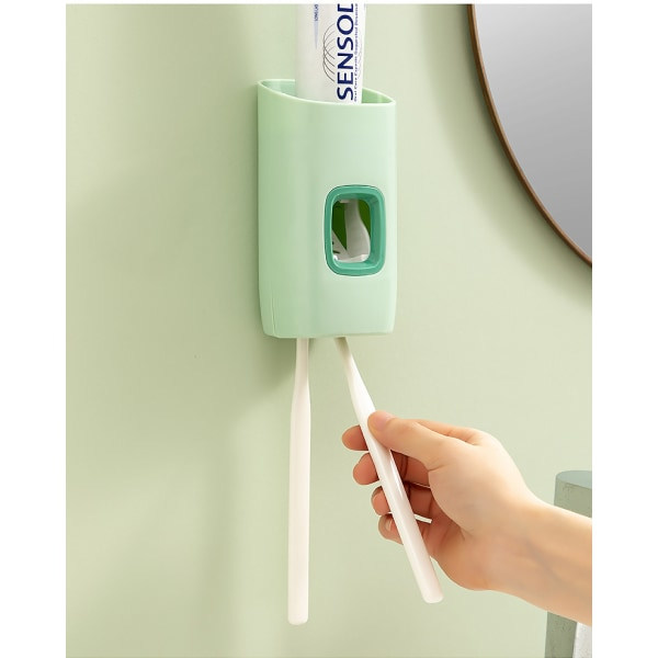 Grön automatisk tandkrämsdispenser Badrumstillbehör