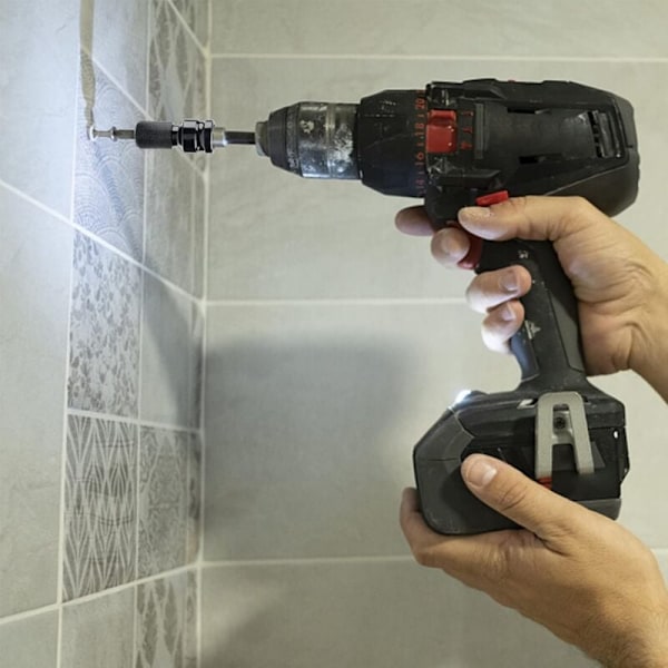 2 kpl 1/2\" neliöveto - 1/4\" hylsyadaptereita, iskumutteriavaimen adapteri, pikavapautusmuunnin iskumutteriavaimelle ja ruuvimeisselin kärjen pidikkeelle