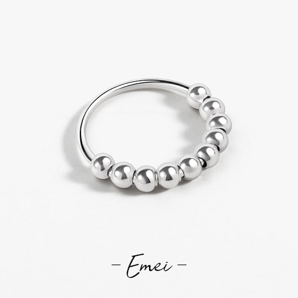 Anti-stress ring med 10 roterende perler i kobber-platin 18.5 mm 18.5 mm