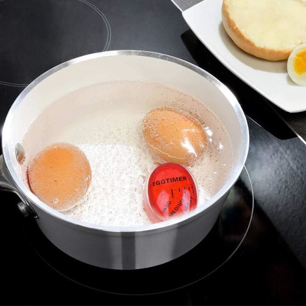 2 äggkokare, velg äggmognad (rød) ved frokost